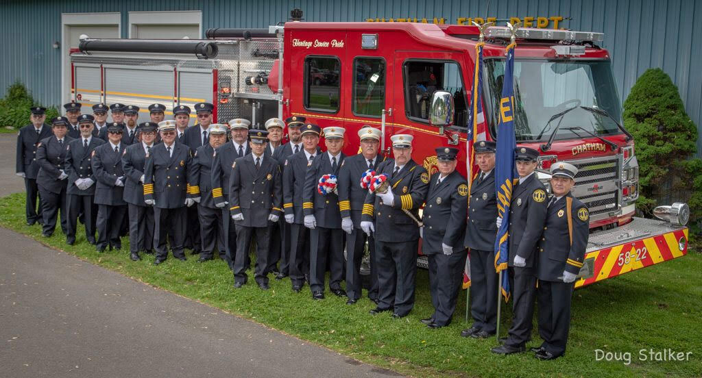 Chatham Fire Department in front of a truck on Veterans Day