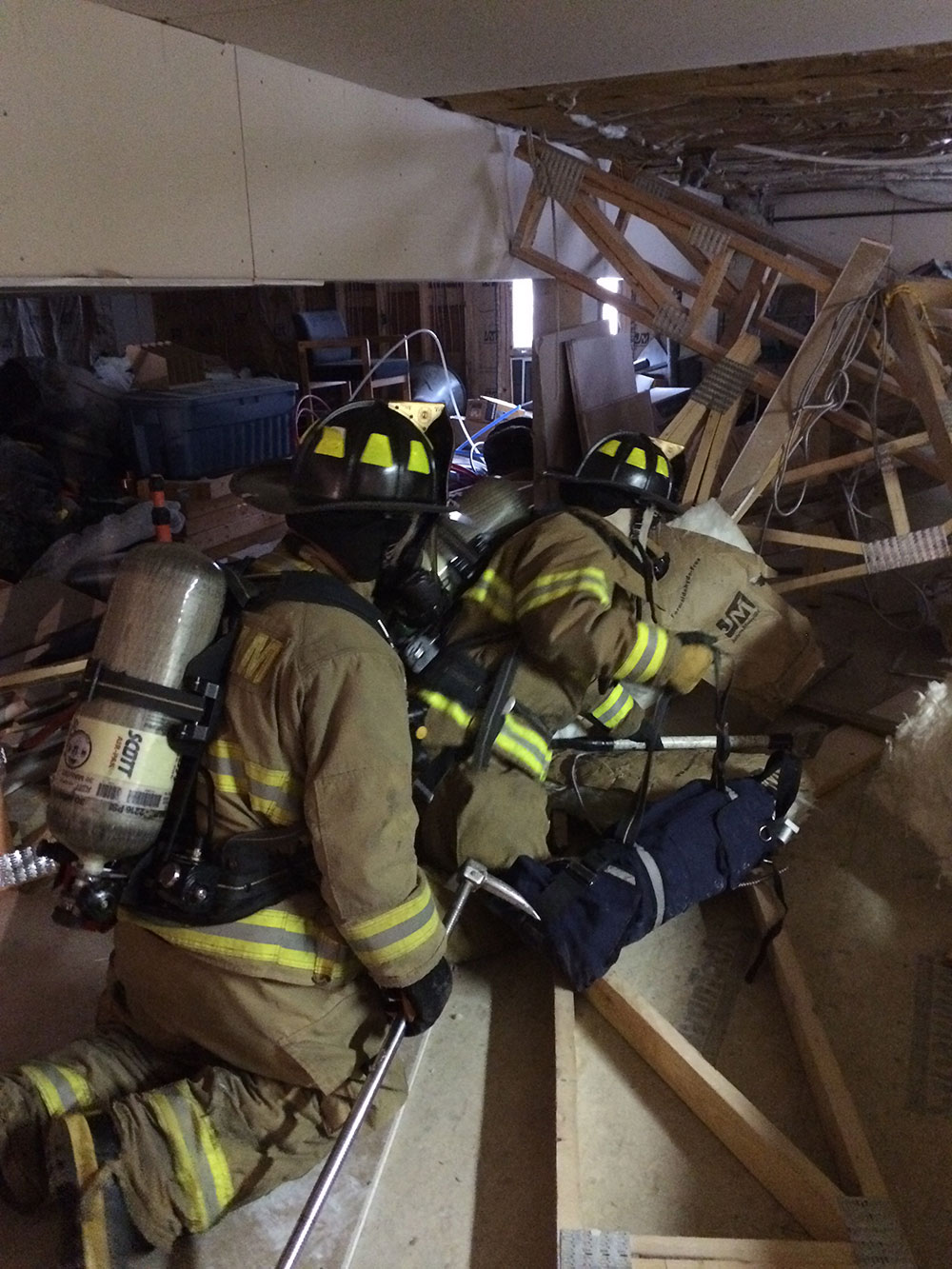 Firefighters in a training maze